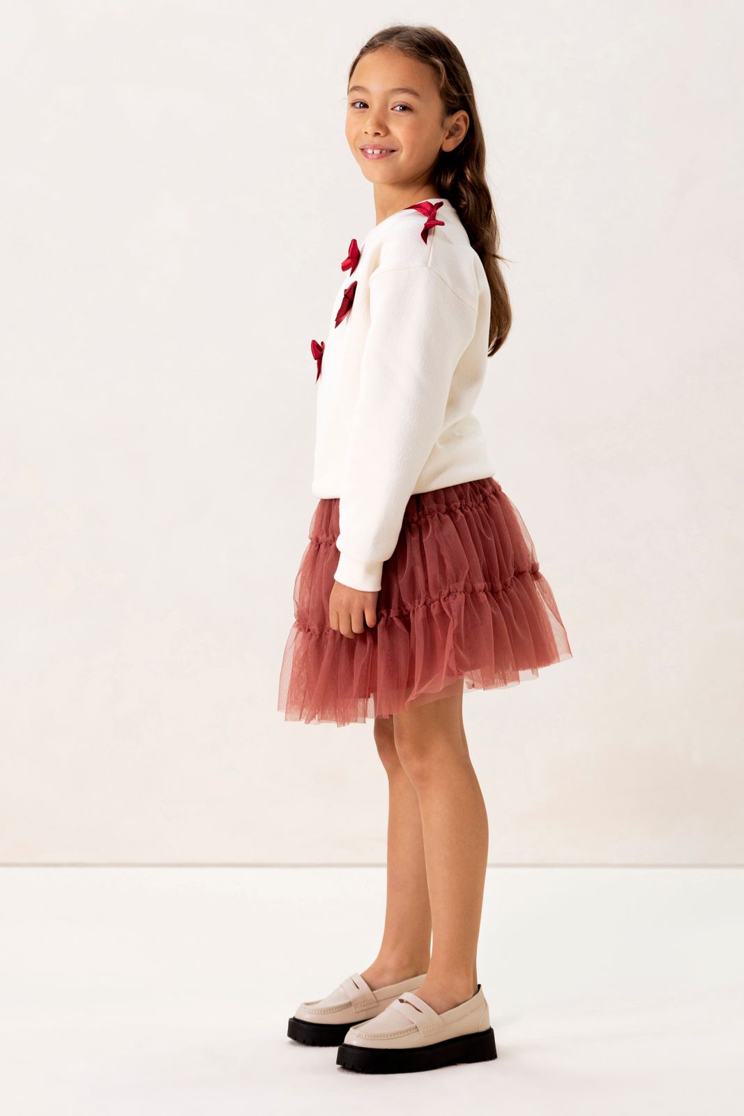 Witte sweater met strikjes