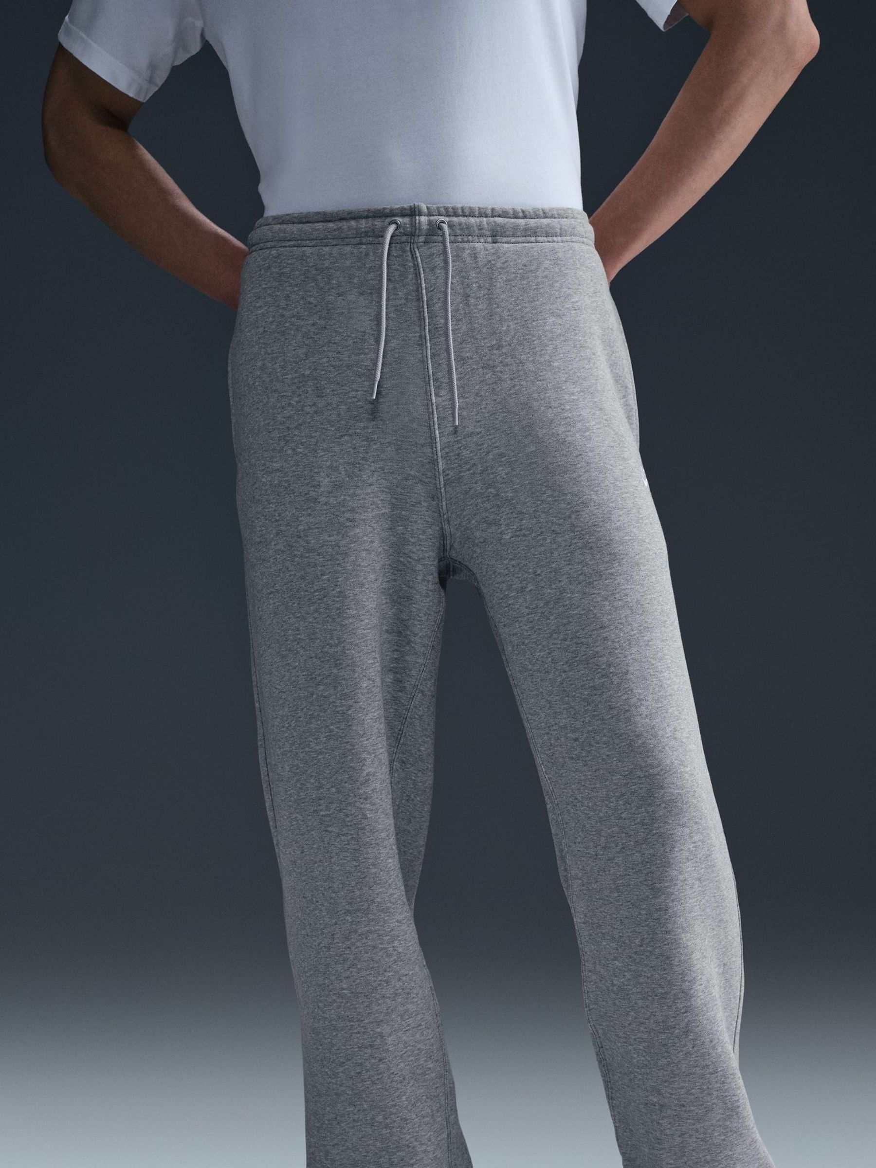 Donkergrijs gemêleerd - Nike Club Fleece joggingbroek met wijde pijpen