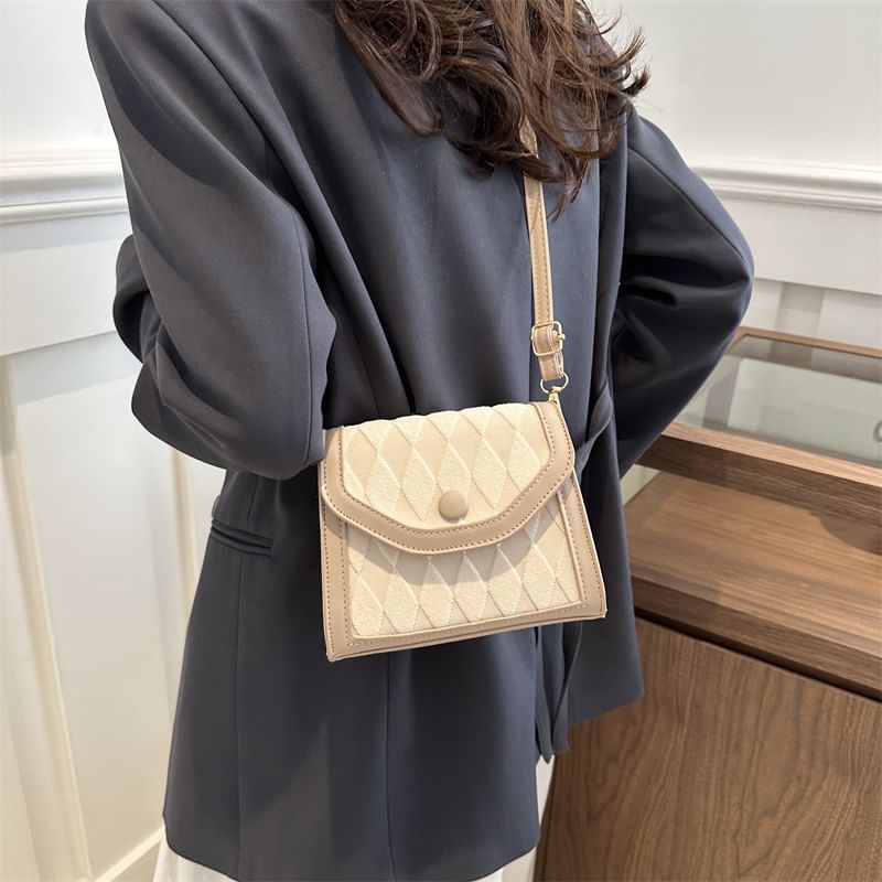 Basaran - Crossbodytas met contrasterende rand en klep