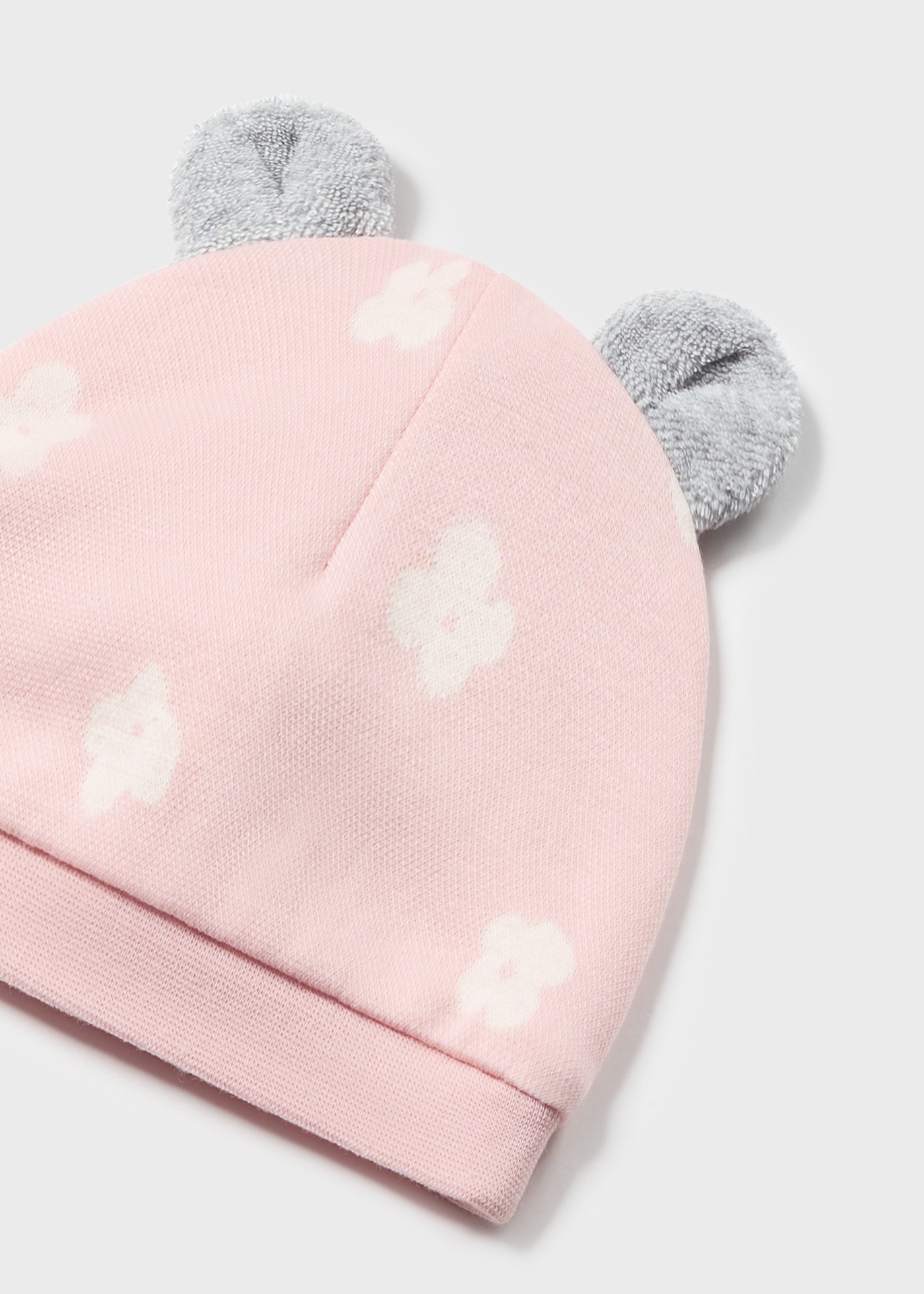 Macacão de algodão Better Cotton para recém-nascidos com gorro.