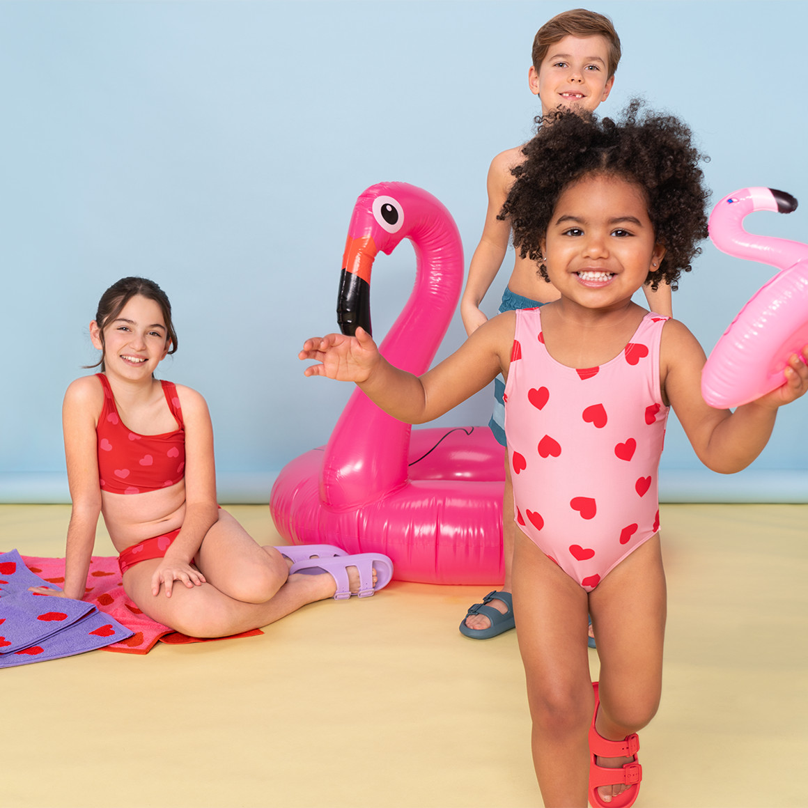 Famy Baby Badeanzug mit Herz-Allover rosa