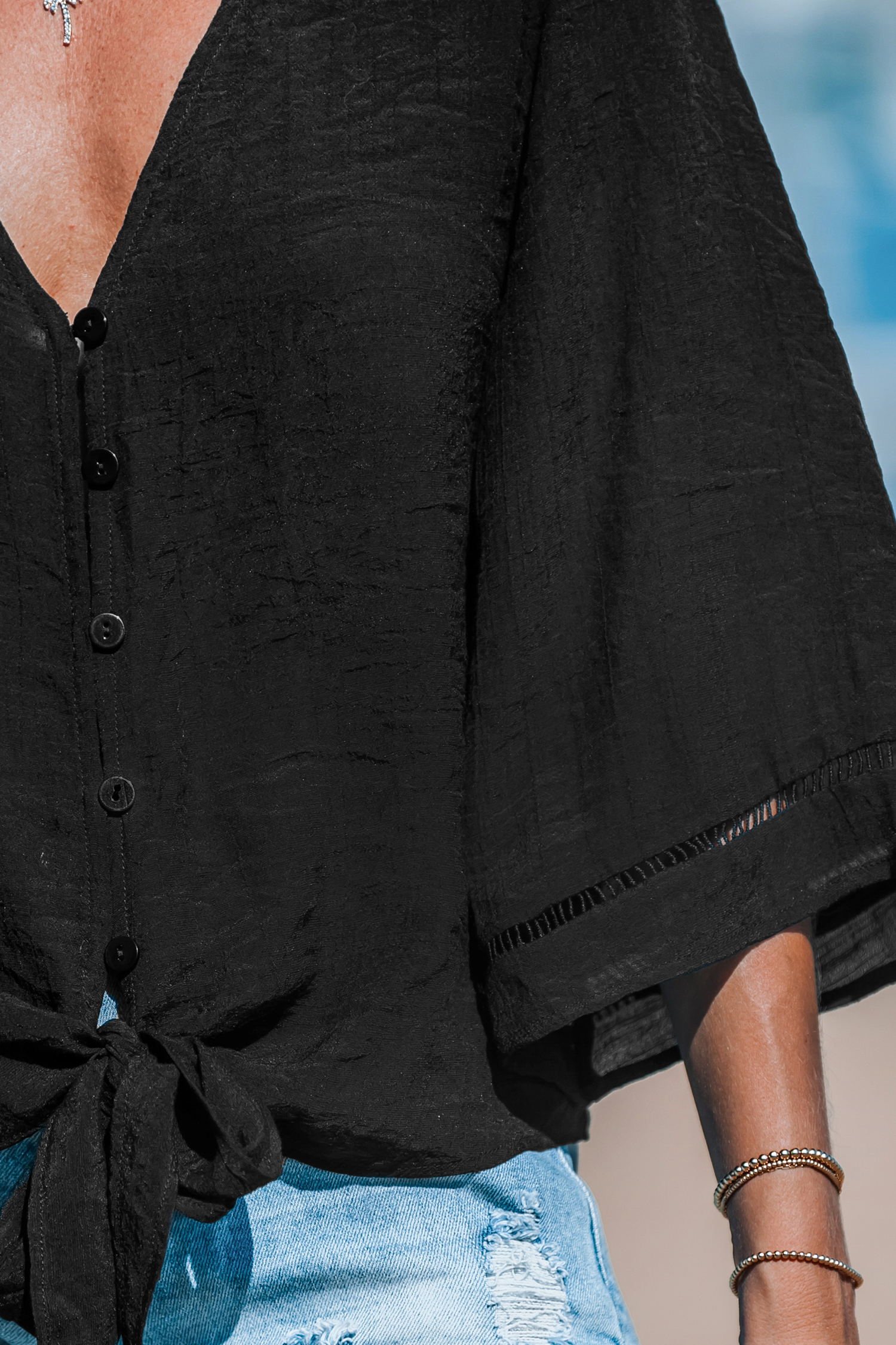 Haut cover up à manches évasées et taille à nouer noir