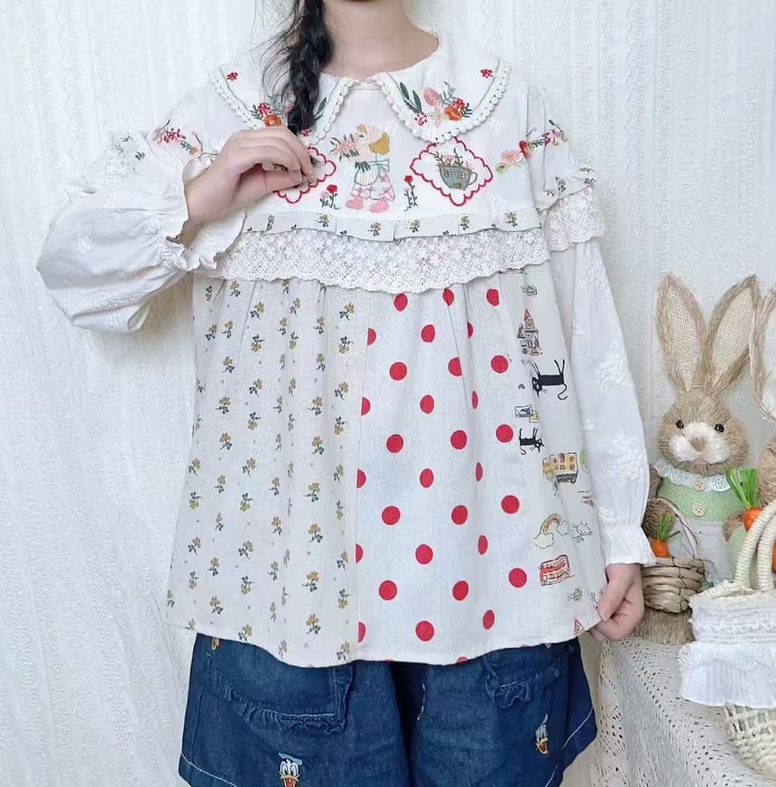 Aigan - Blouse met pofmouwen en kantversiering