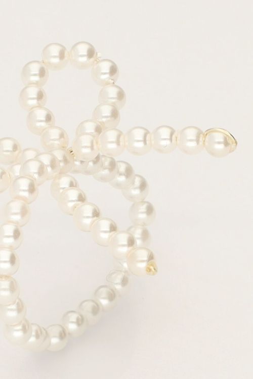 Elastieken ring met parels en strik