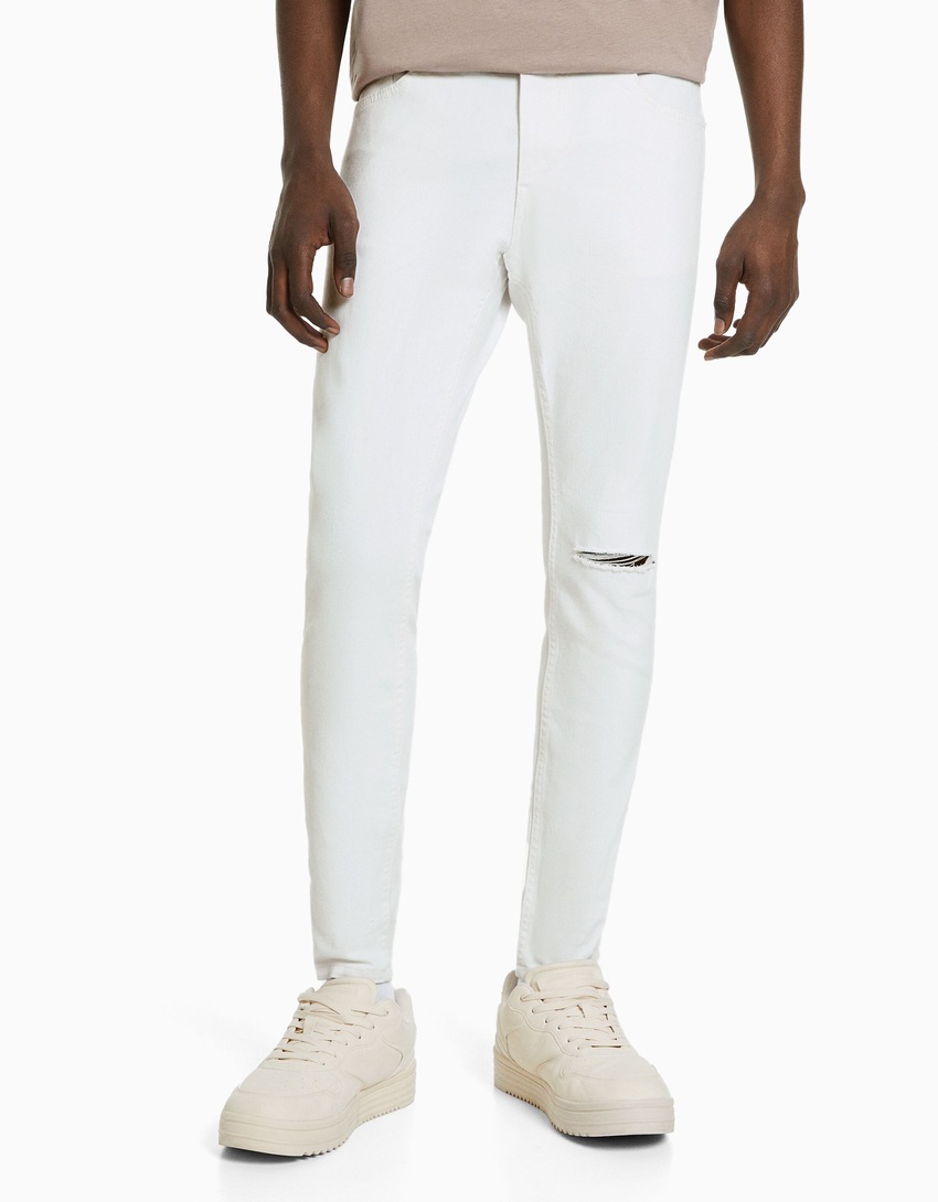 calças jeans super skinny