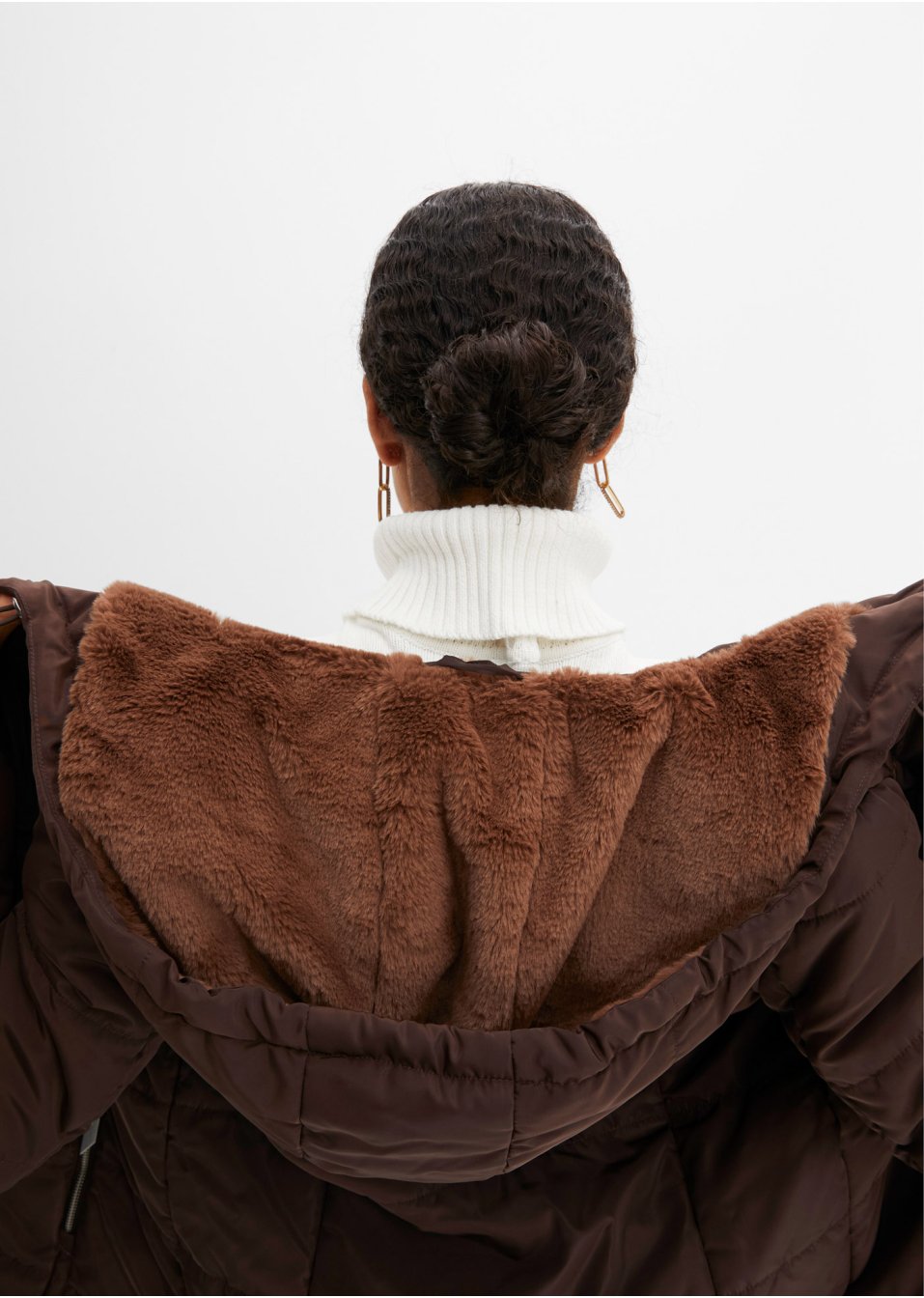 Manteau matelassé avec zip asymétrique