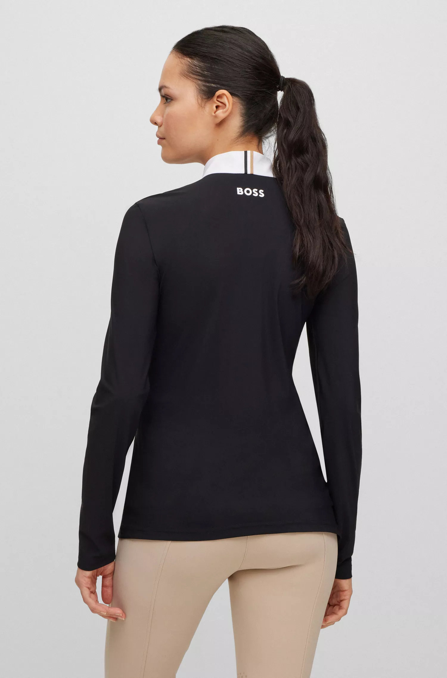 Camisa de competição BOSS Black-Equestrian slim-fit em tecido power stretch.