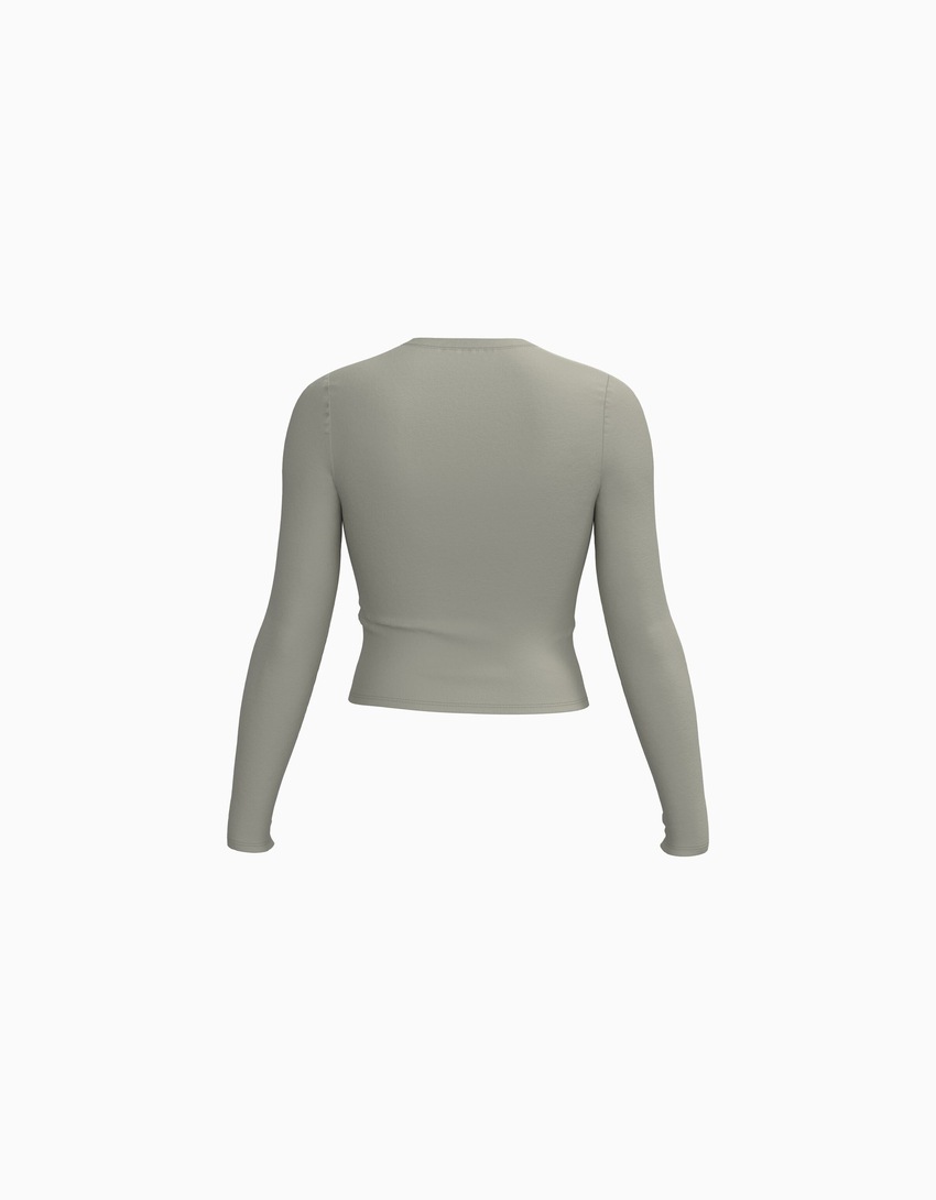 Camiseta de manga comprida com estampa, tendência do momento.