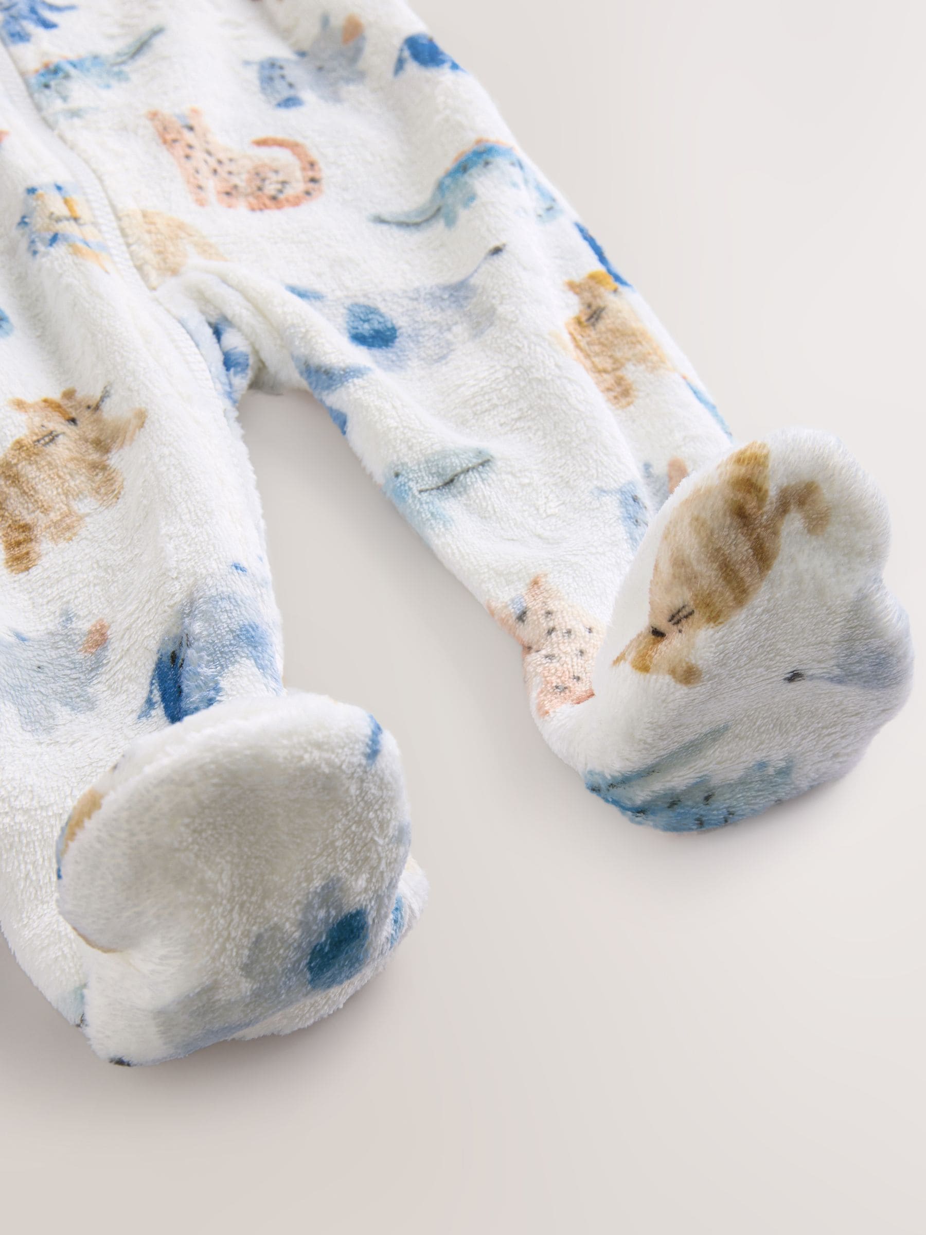 Ecru met safariprint - Fleece babypyjama