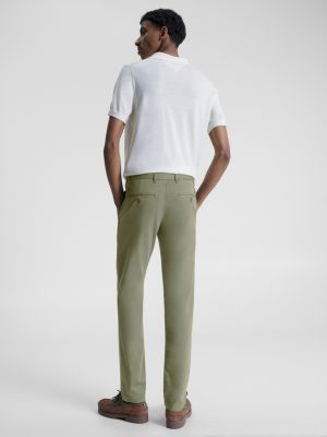 Calças chino slim fit tingidas em peça da Bleecker