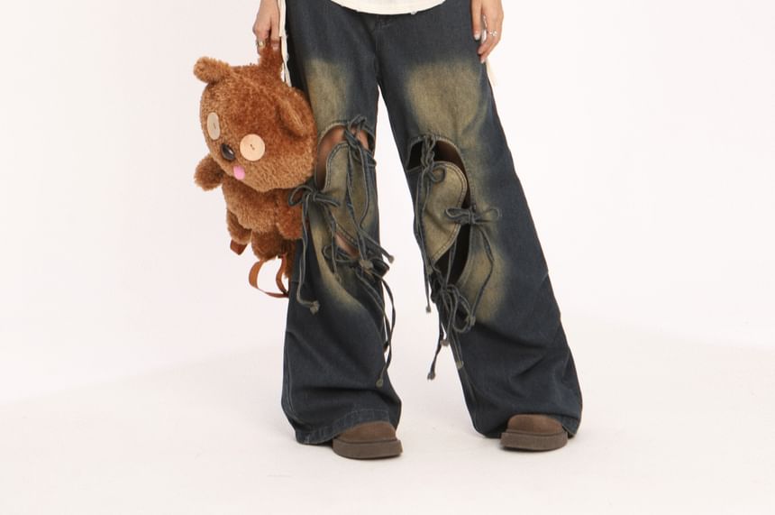 Berrytrix - Lage taille jeans met strikaccent en uitsparingen, gewassen en wijde pijpen