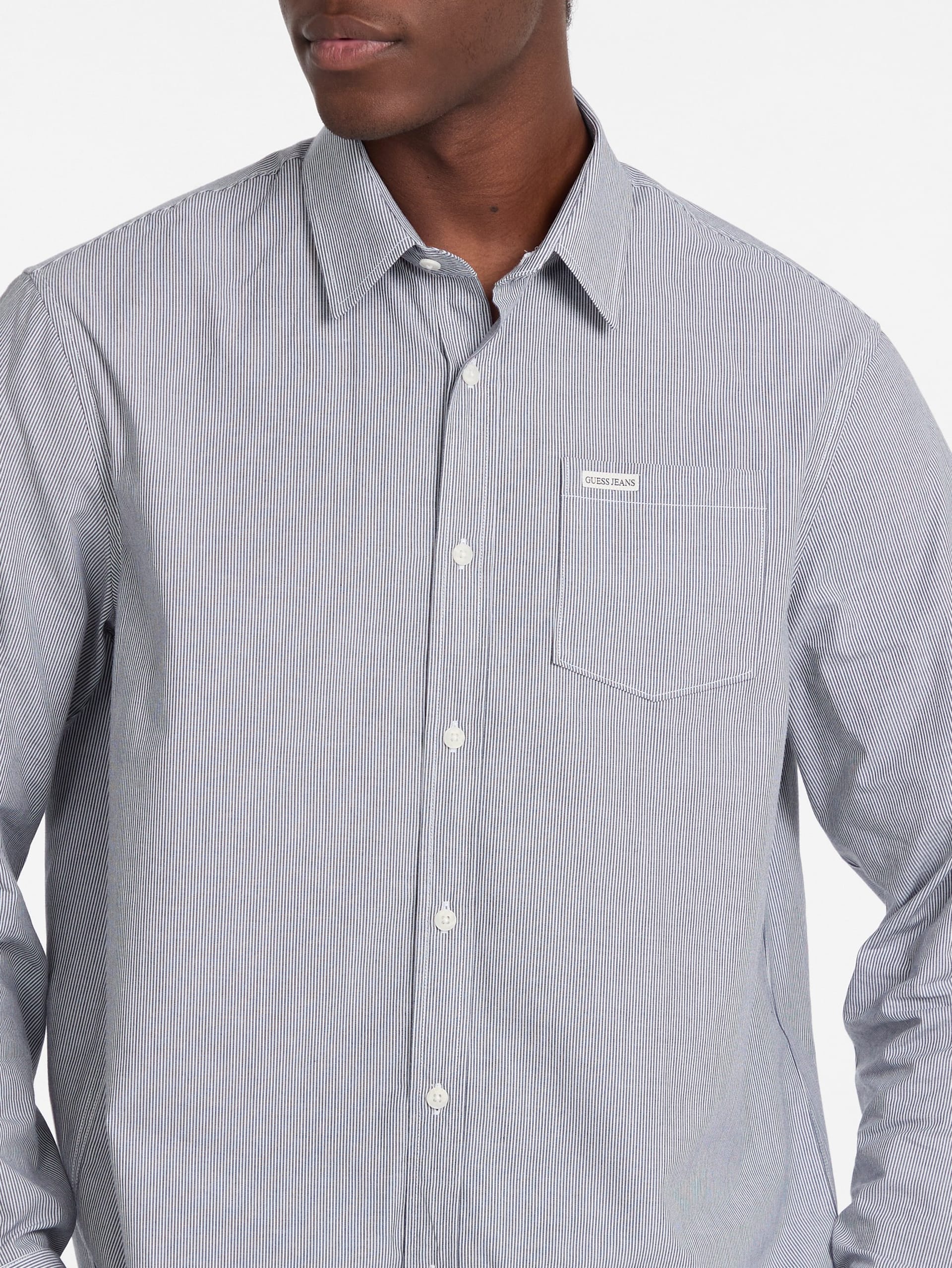 Camisa listrada com bolso
