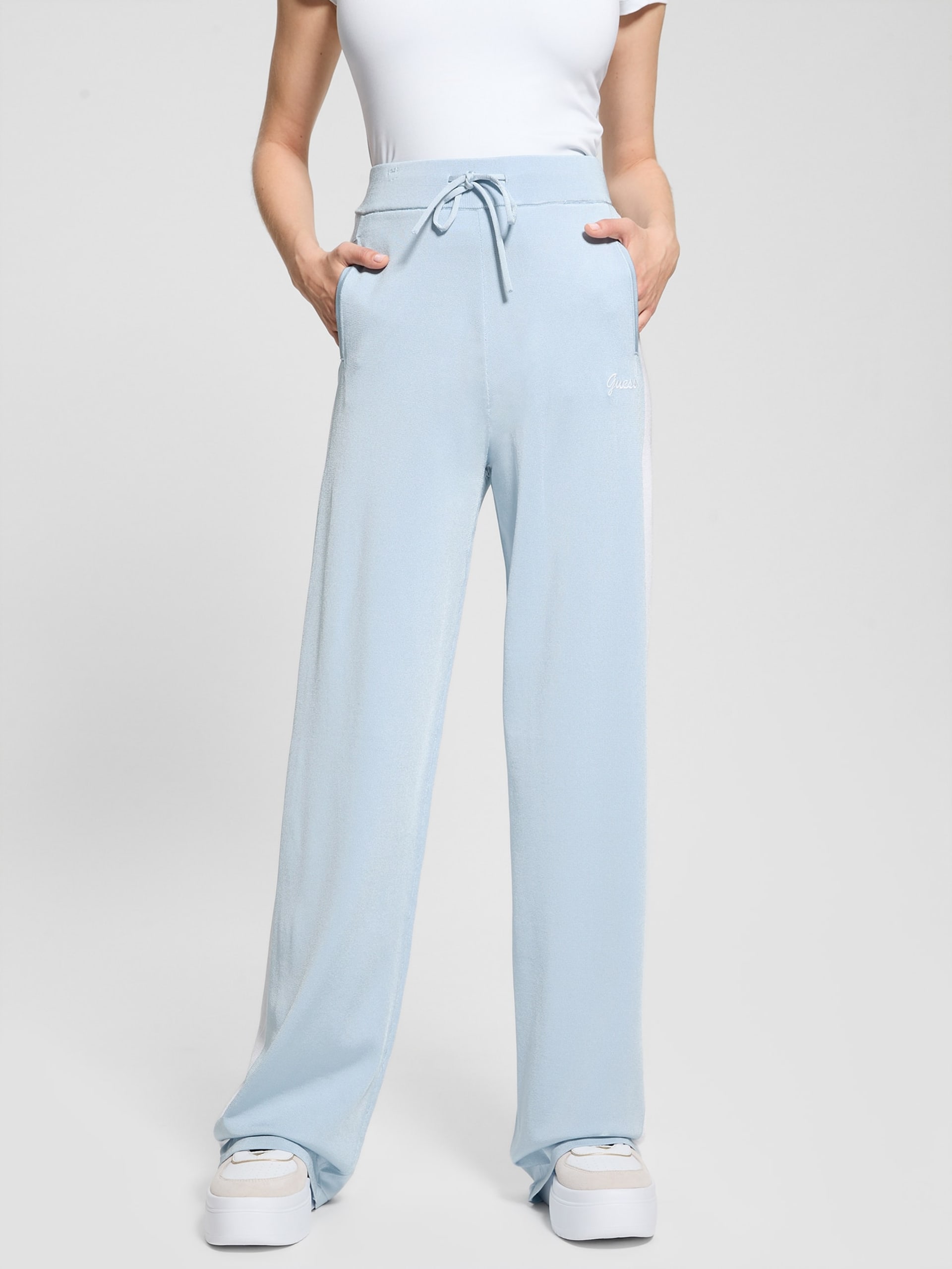 Calça de malha listrada