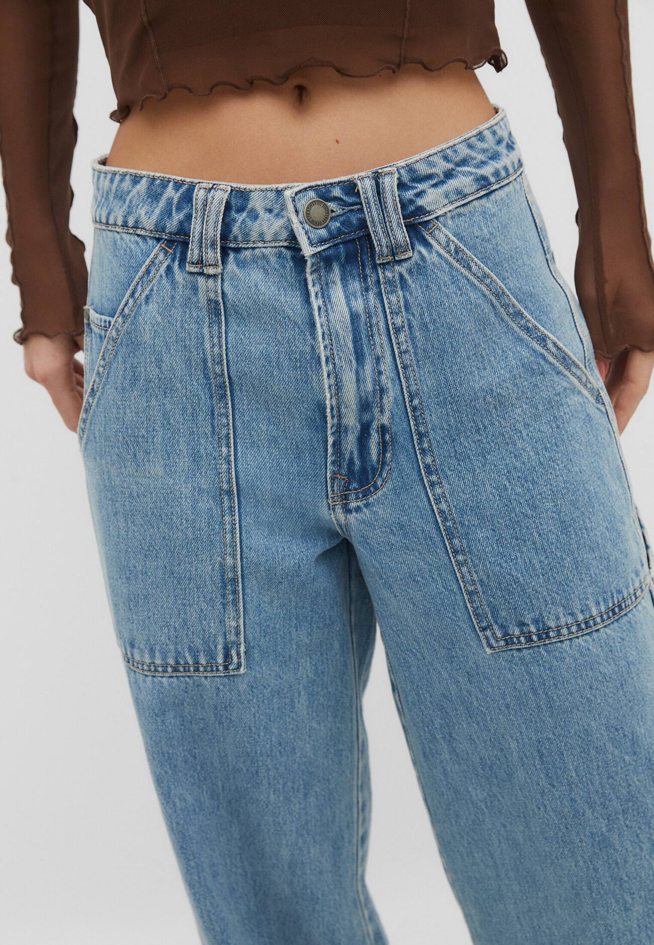 Calça jeans de carpinteiro