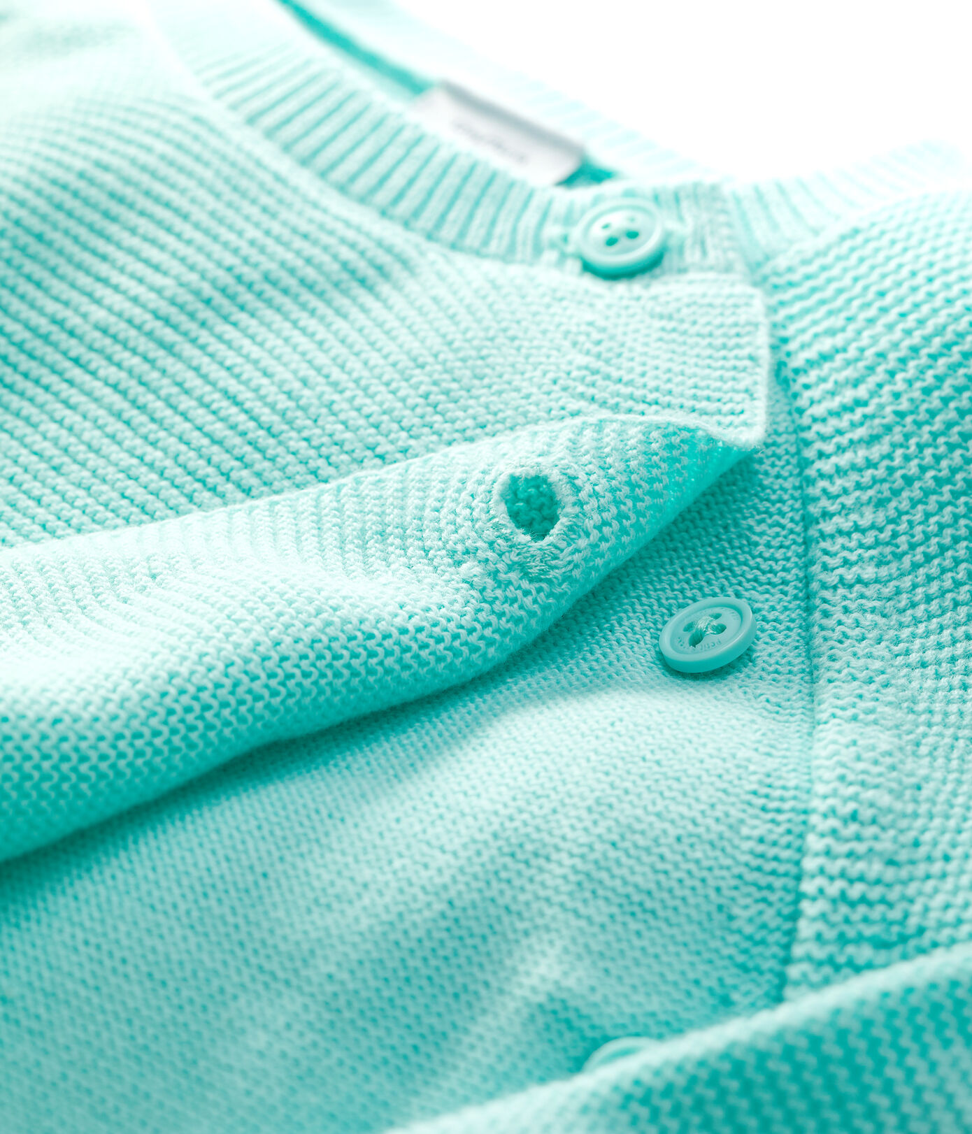 Cardigan bleu bébé en tricot de coton biologique