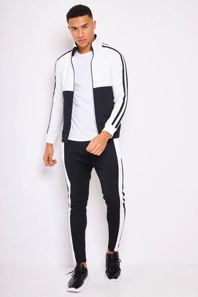 Ensemble bicolore noir/blanc veste + pantalon de jogging