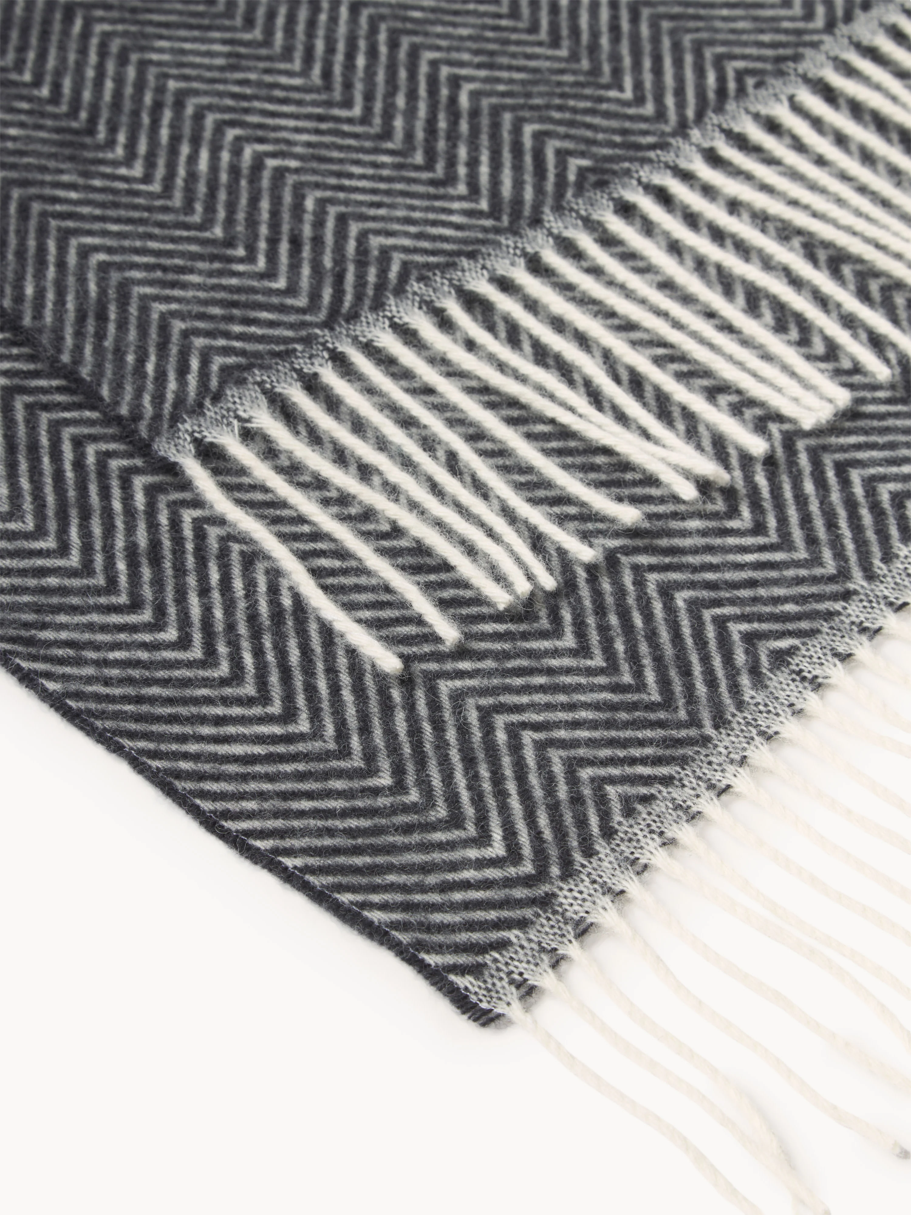 Wollen plaid Tyrol met visgraatpatroon en franjes