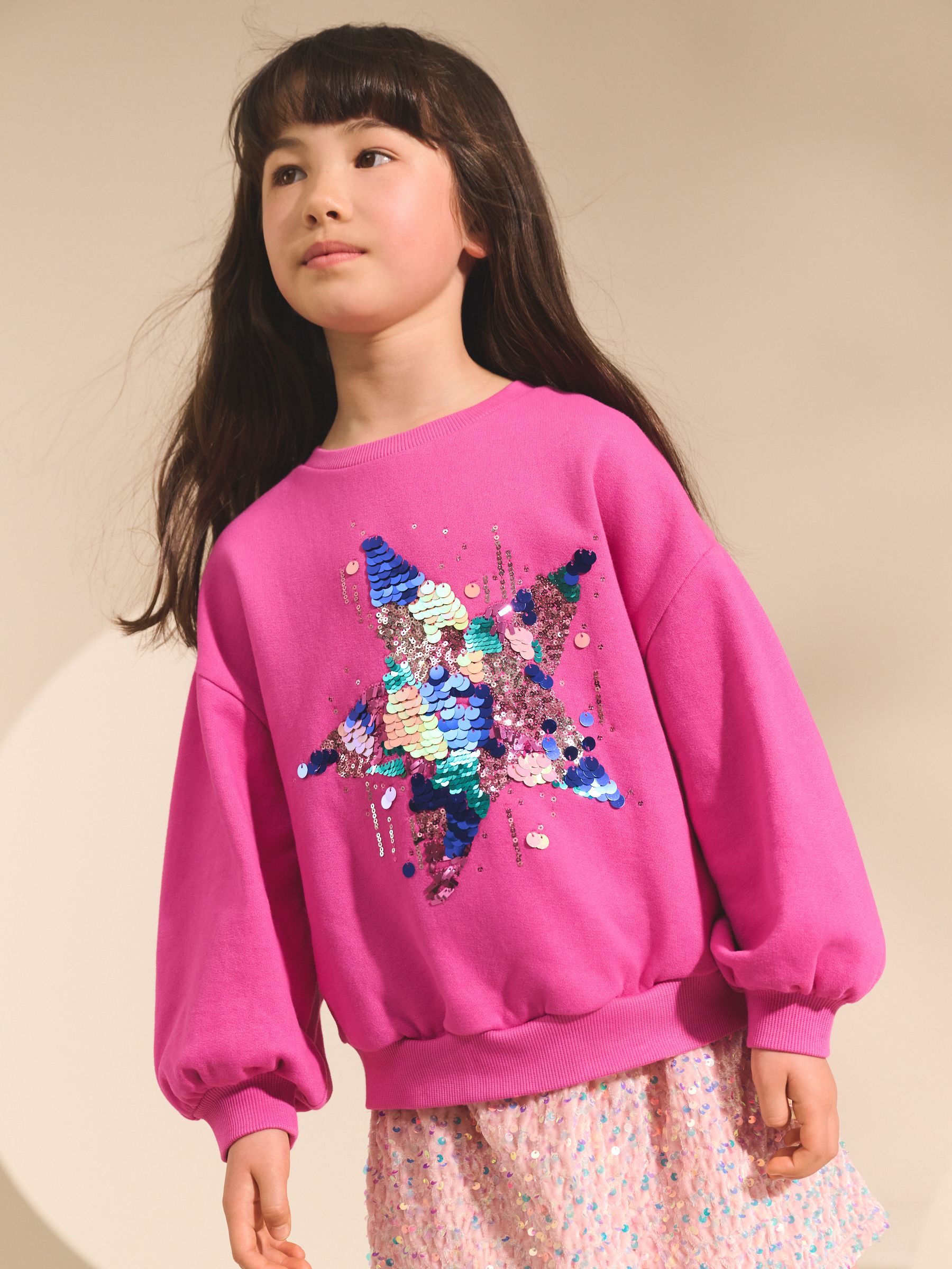 Felroze met lovertjesster - Sweatshirt (3 - 16 jr)