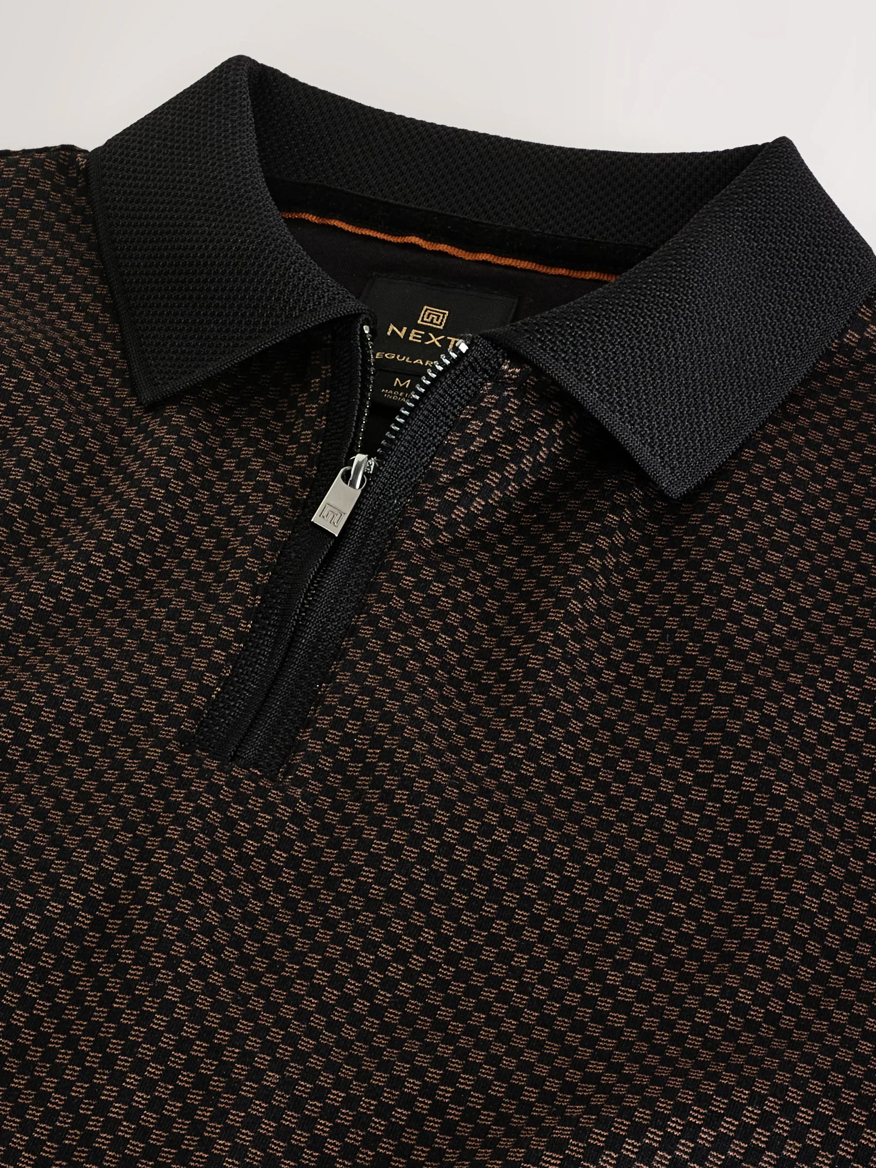 Zwart met goud - Modieus poloshirt met kwartrits