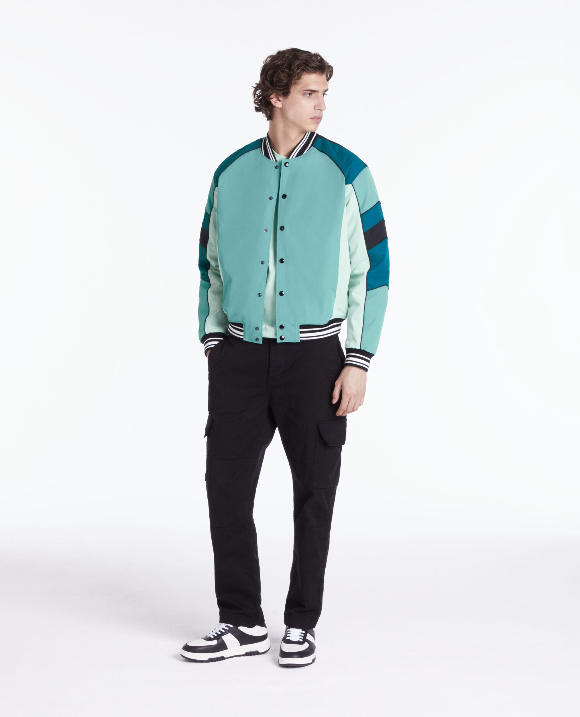 Blouson bleu et vert avec patchwork