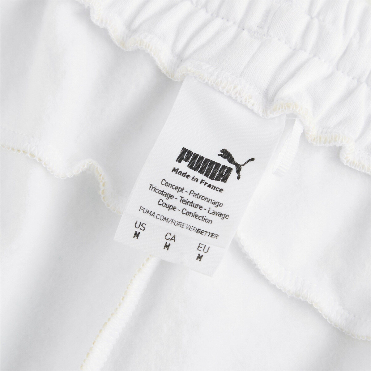 Calções PUMA fabricados na França com logotipo bordado