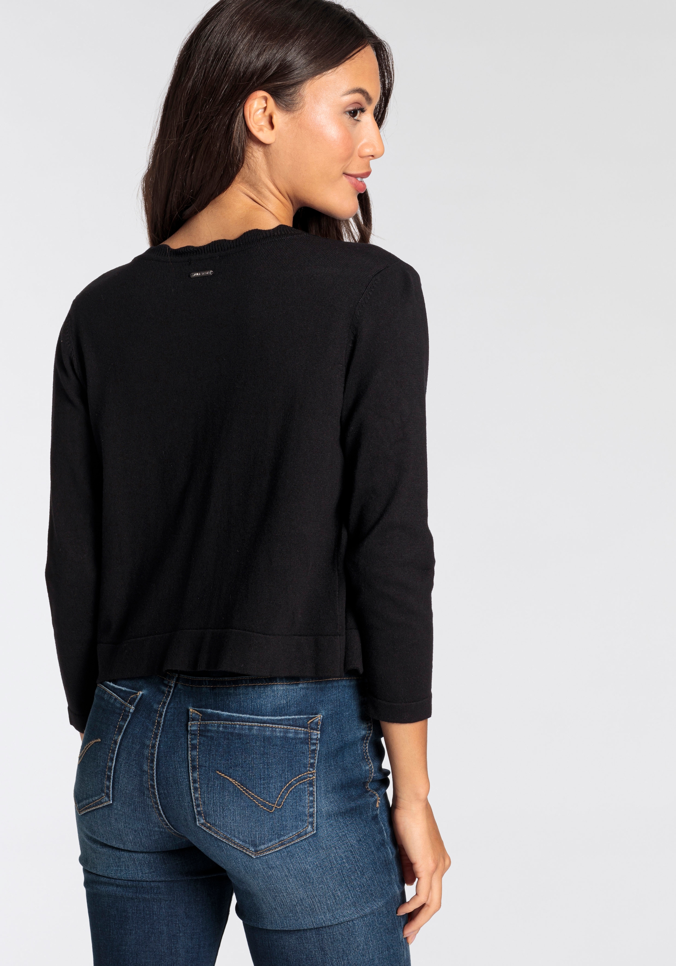 Laura Scott Strickjacke , mit femininer Wellenkante