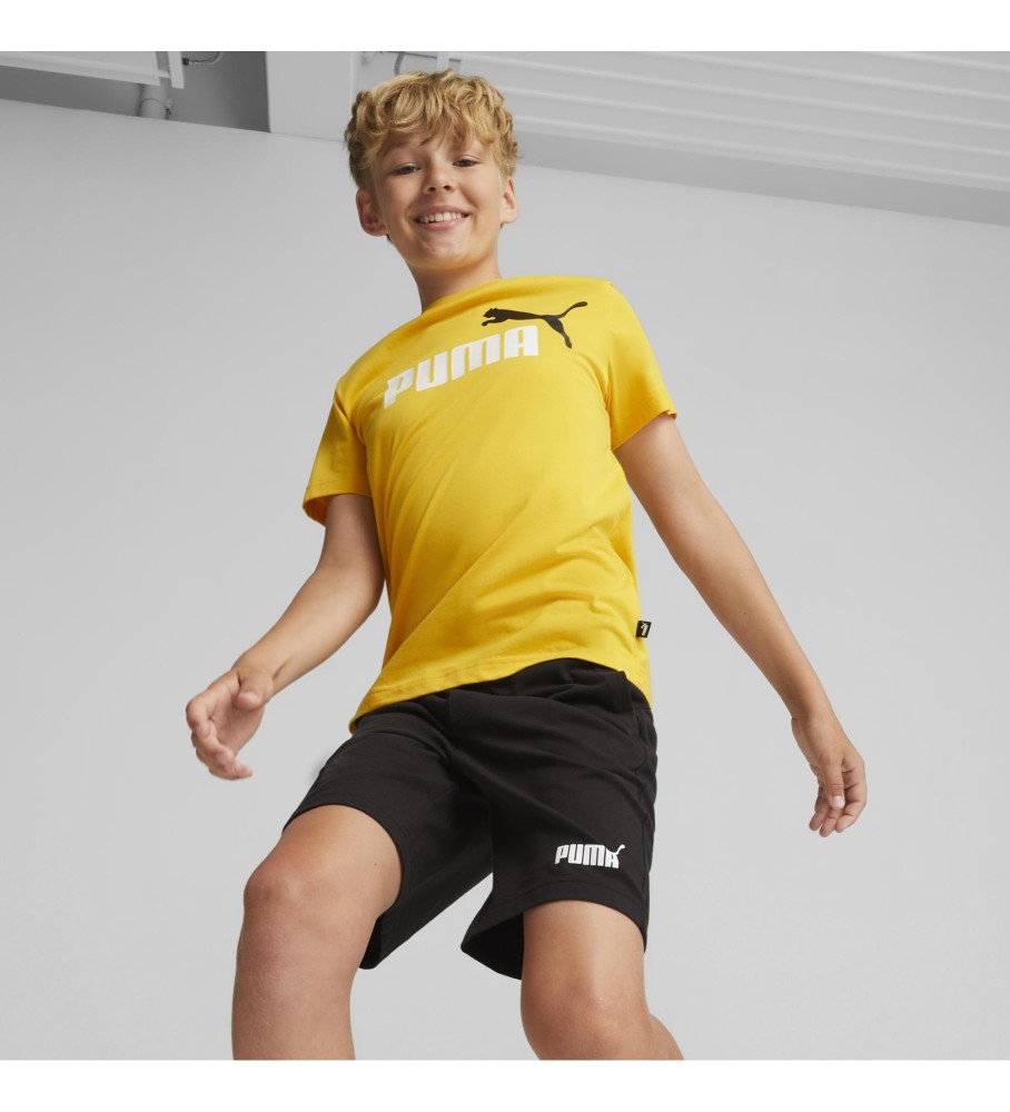Conjunto de camisa e shorts amarelos da Puma