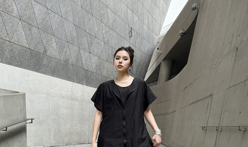 KUMI - Jumpsuit met korte mouwen en wijde pijpen