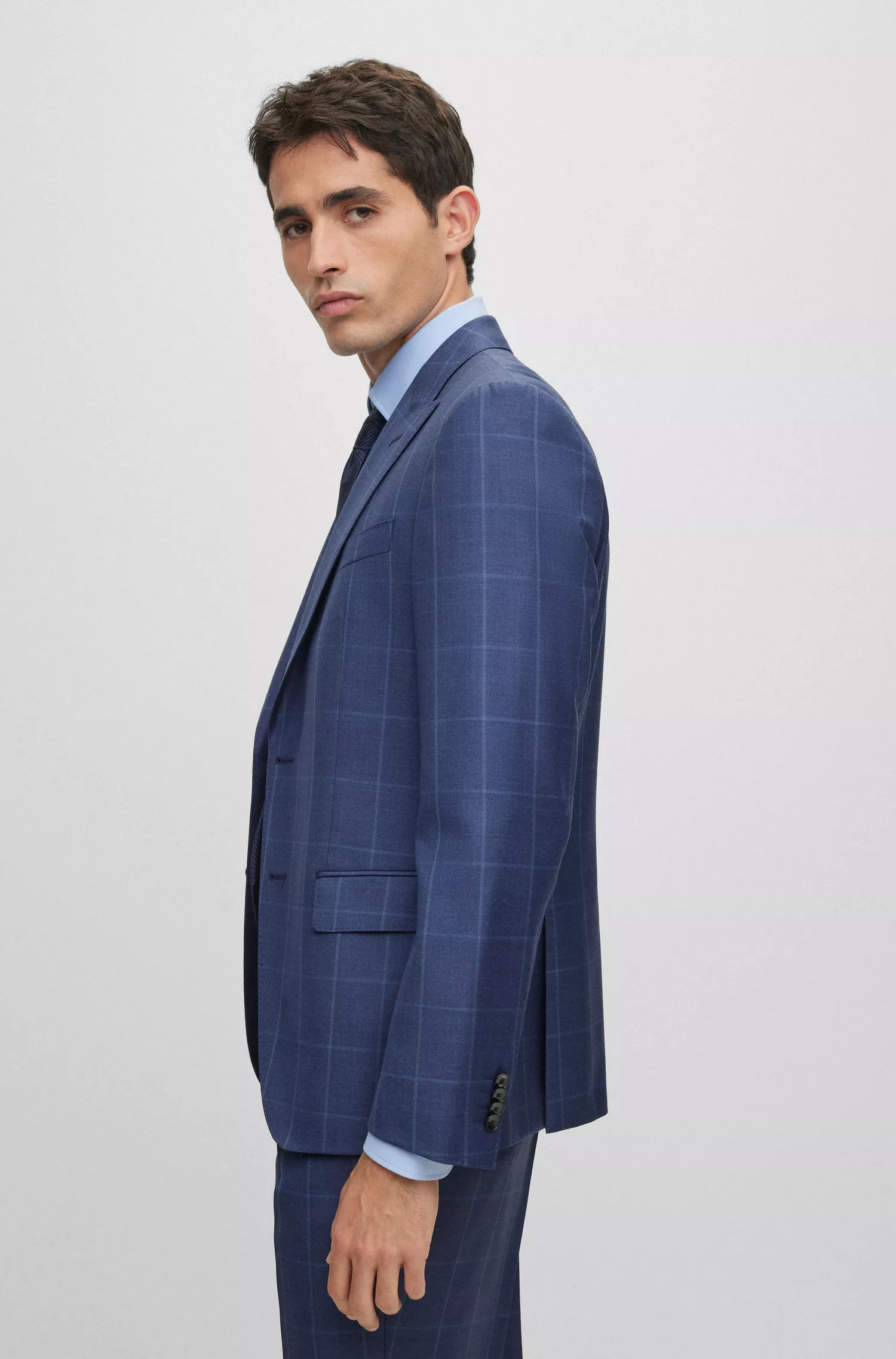 Terno BOSS preto de duas peças, corte slim, em lã virgem xadrez.