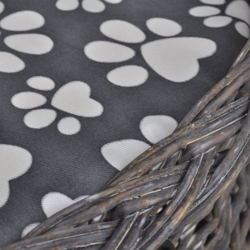 Cama de vime para gatos na cor cinza.