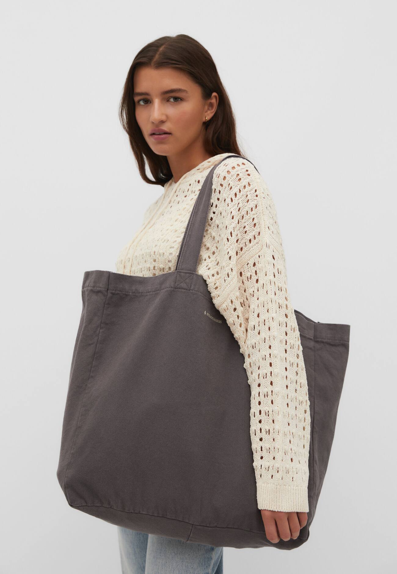 Bolsa de tecido com efeito desbotado