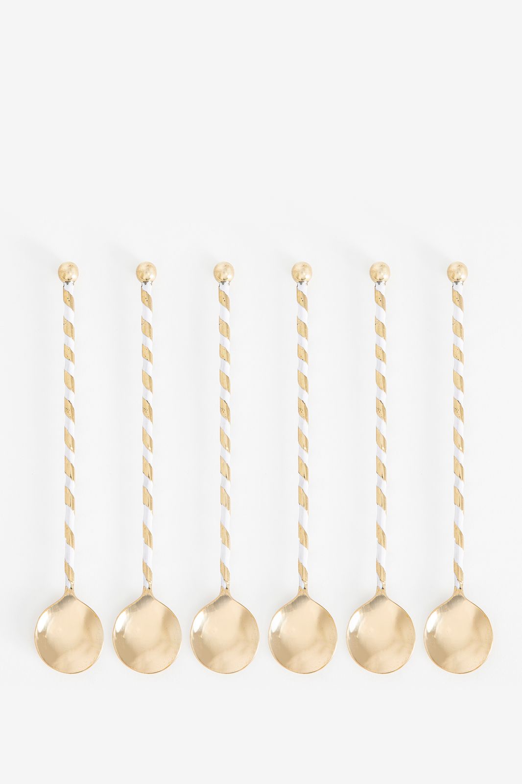 Goudkleurige latte lepel circus lichtpaars