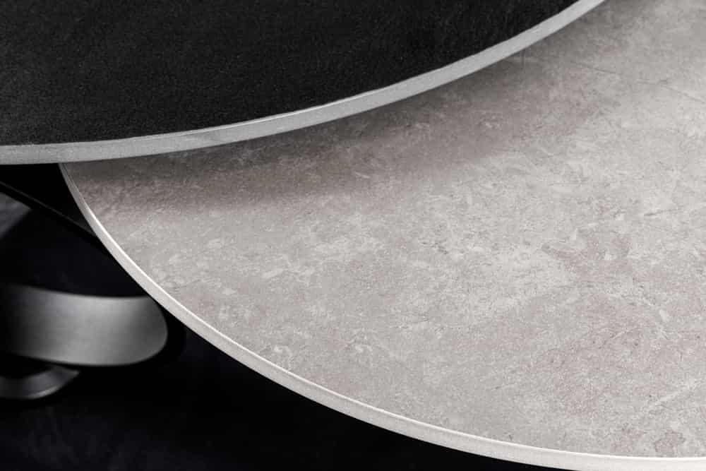 Design Couchtisch DANCING RINGS schwarz grau rund drehbar Keramik Metall