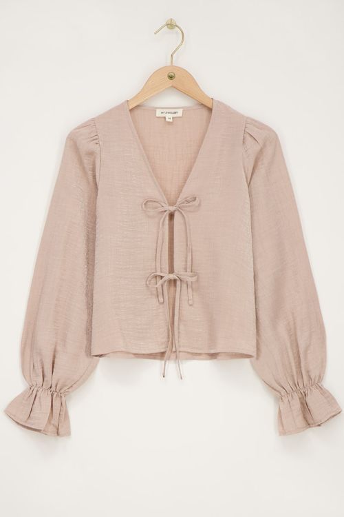 Beige shiny top met strikjes & ruffle mouwtjes