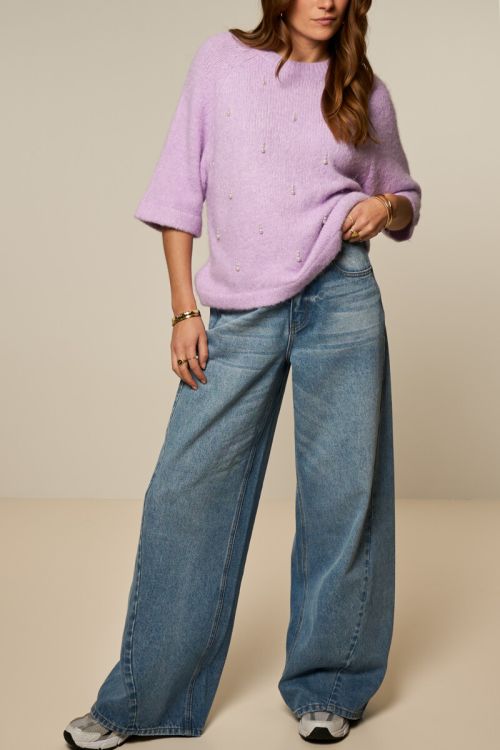 Blauwe wide leg jeans met schuine zoom