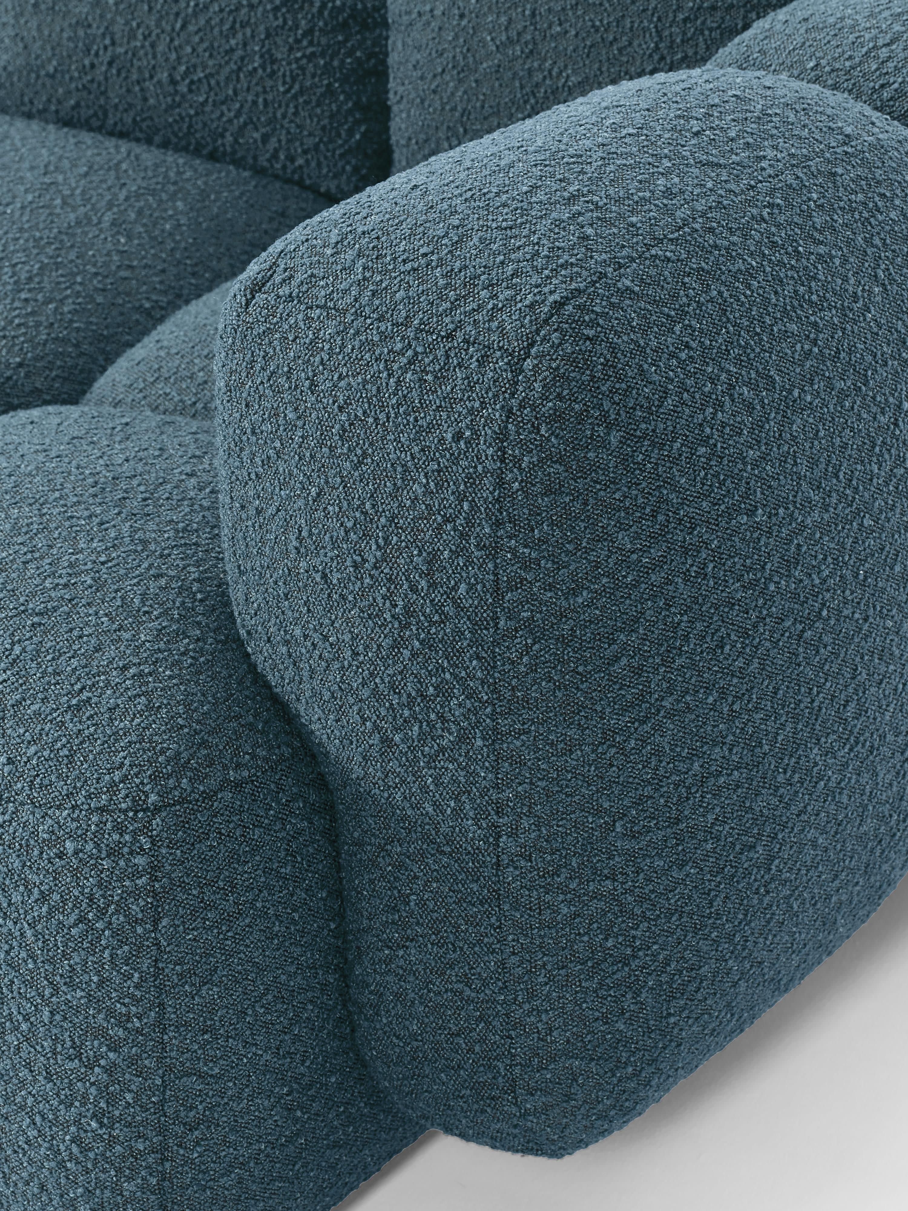 Modulaire bank Tayla (3-zits) van bouclé met poef (links/rechts)