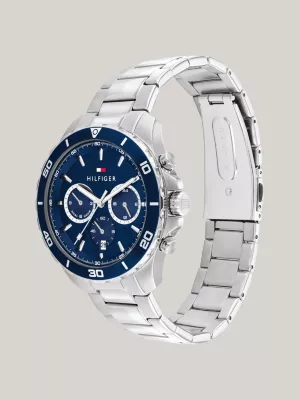 Relógio esportivo com mostrador azul e pulseira de aço inoxidável.