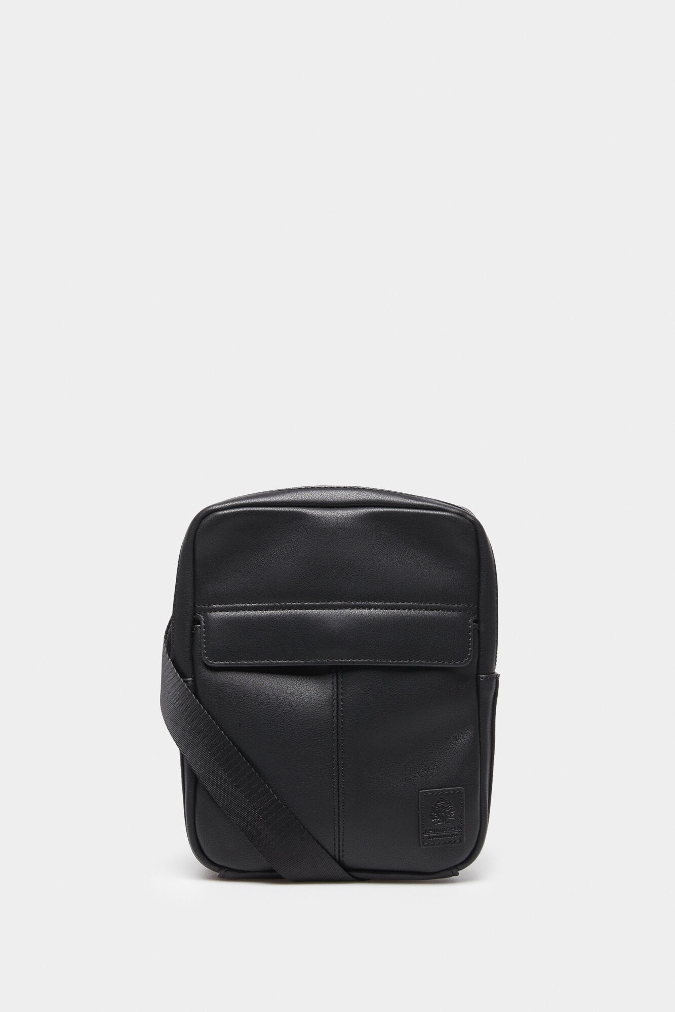 Bolsa transversal média com efeito de couro sintético.