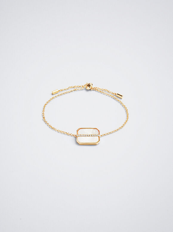 Pulseira dourada com cristal e concha - Dourada