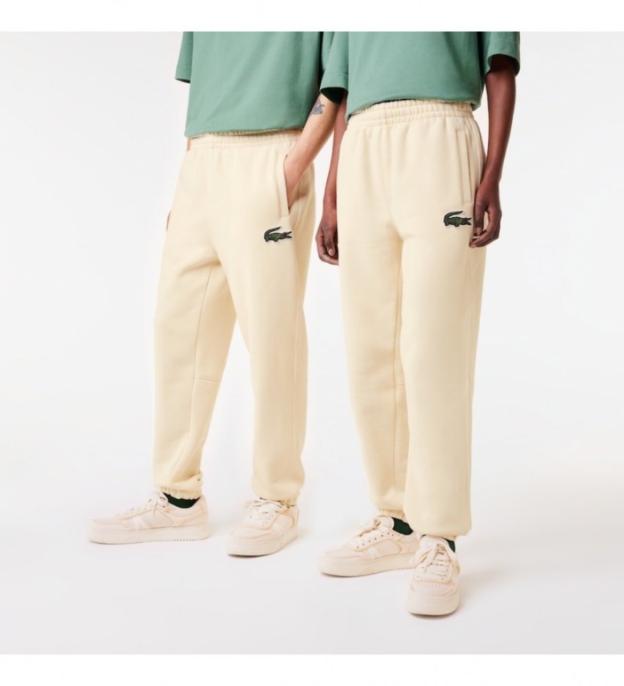 Calça de treino Lacoste unissex em fleece bege.