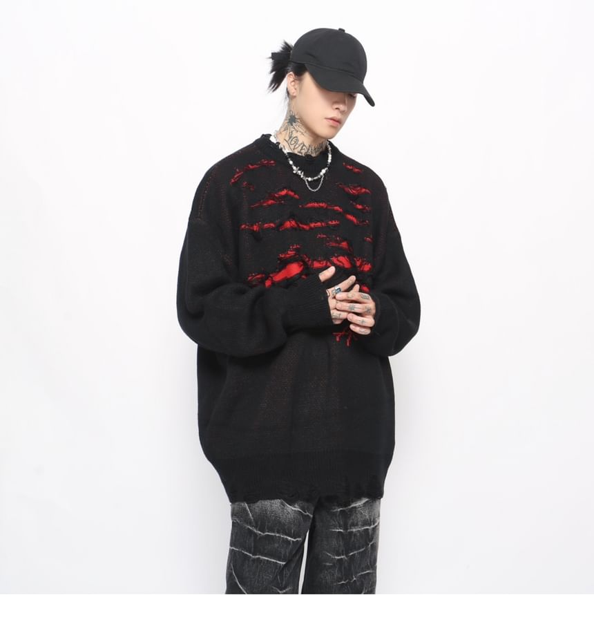 Derbundy - Oversized trui met ronde hals en distressed letters
