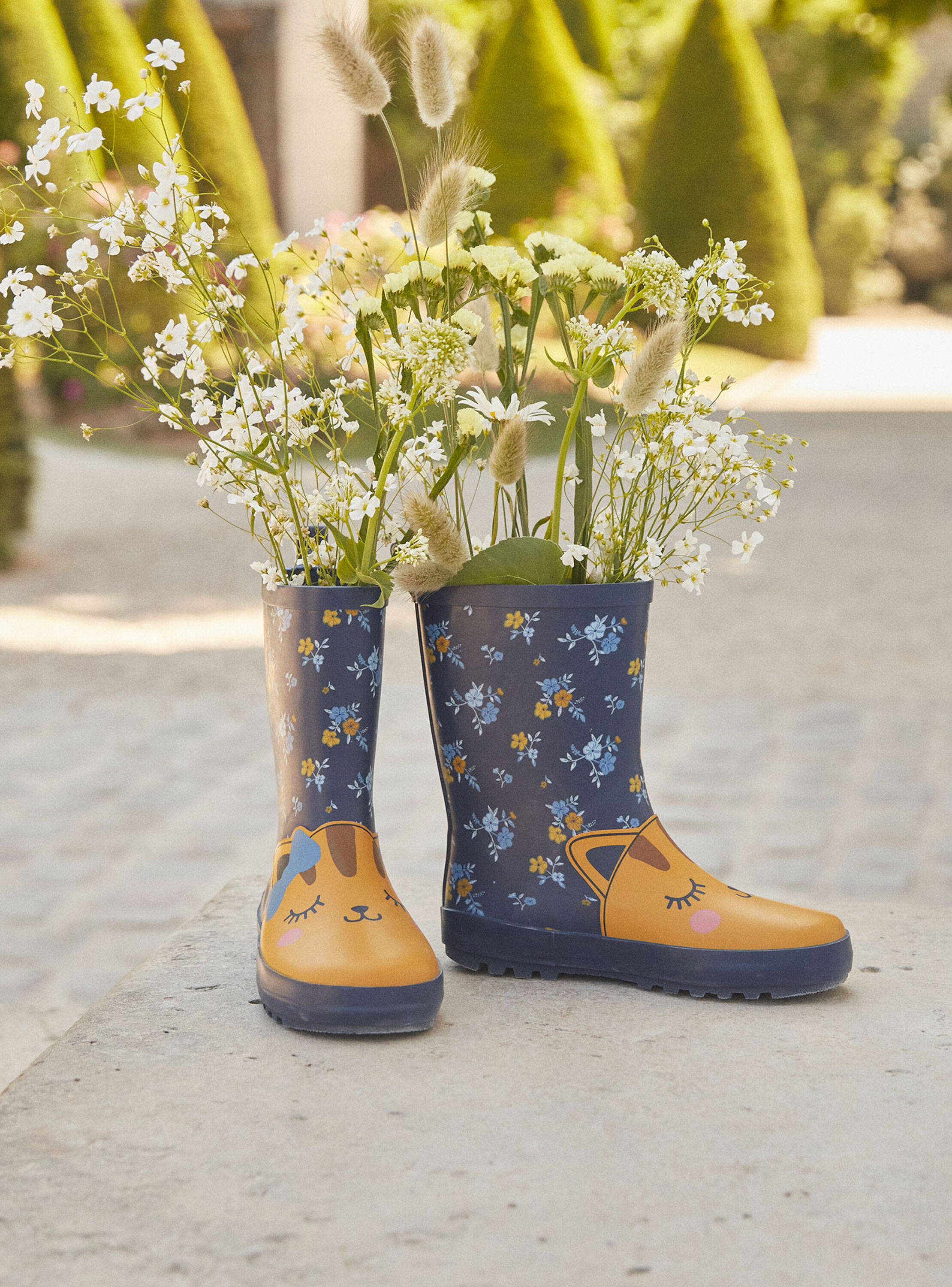Bottes de pluie bleues à imprimé fleuri