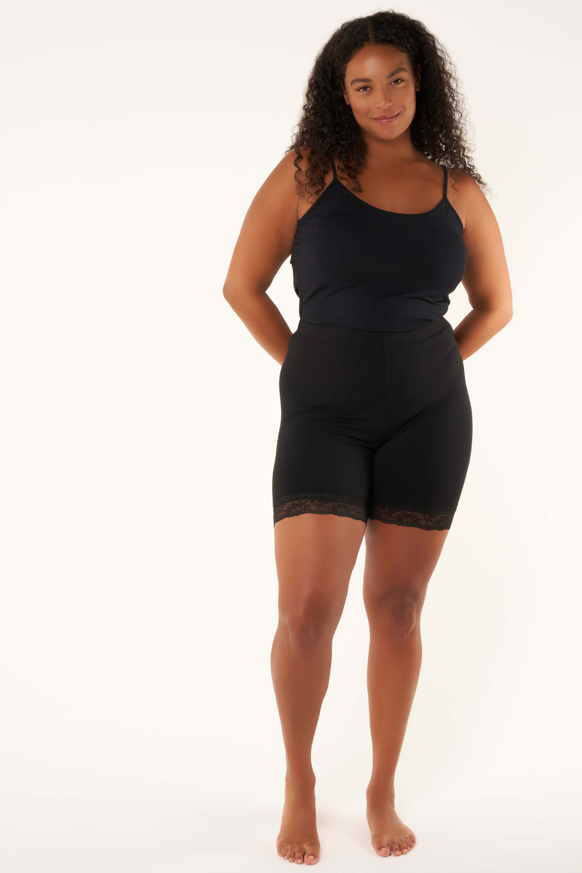 Korte legging met kant Zwart