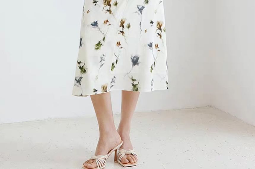 Puffie - Midi-jurk met spaghettibandjes en bloemenprint