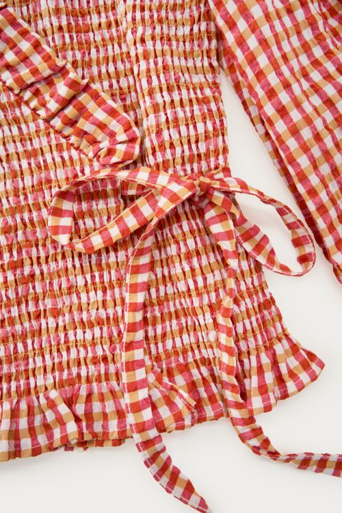 Oranje geruite smock top