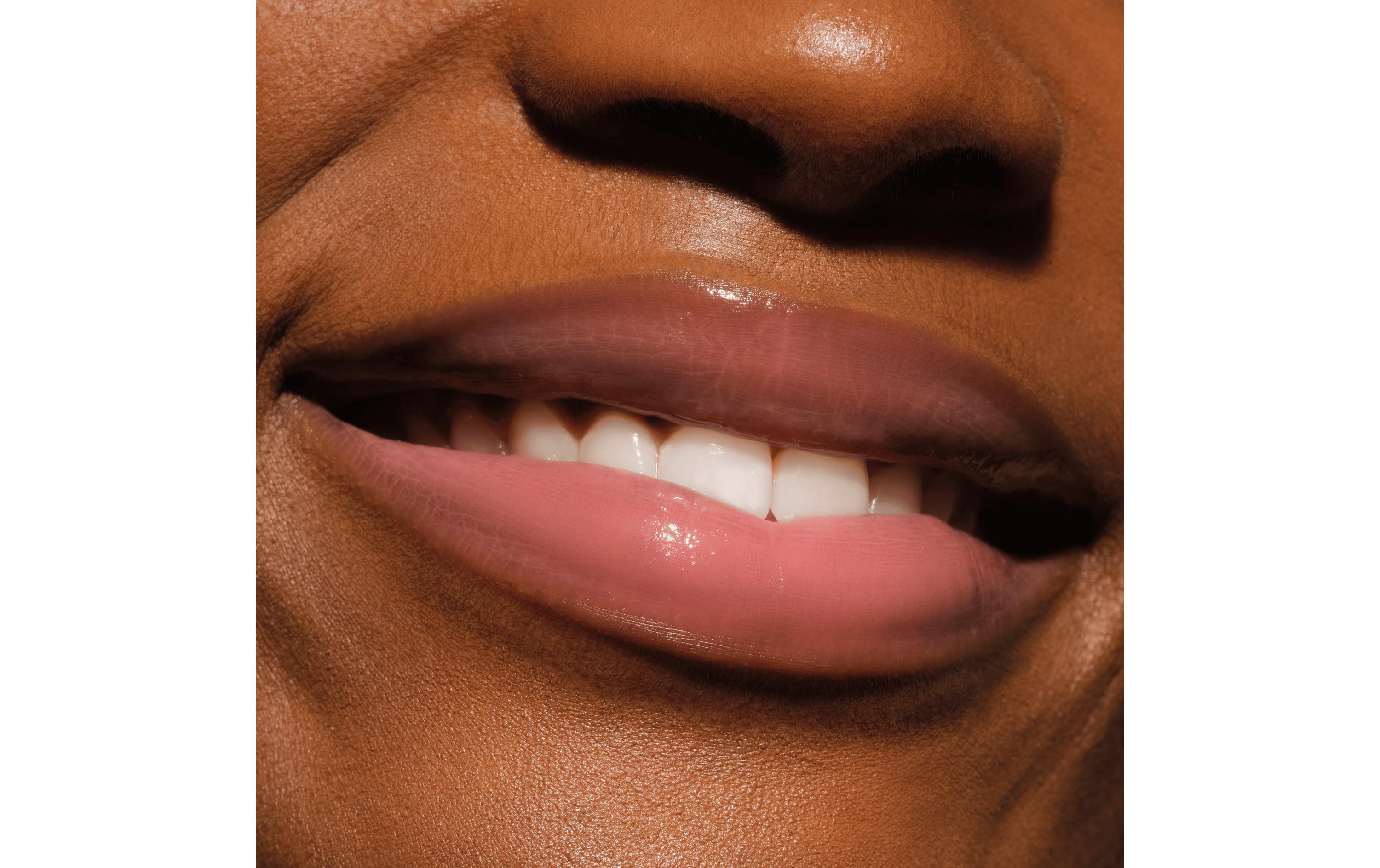 Lip Gloss Butter Drippin' Glossy 010 Pink Lemon SqueezinFeuchtigkeitsspendender, glänzender Lippenbalsam in zartem Rosa