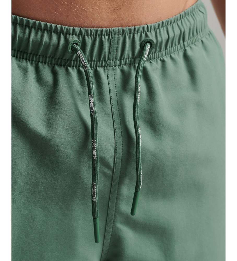 Maiô Superdry tamanho 48cm com apliques, confeccionado em material reciclado ecológico.