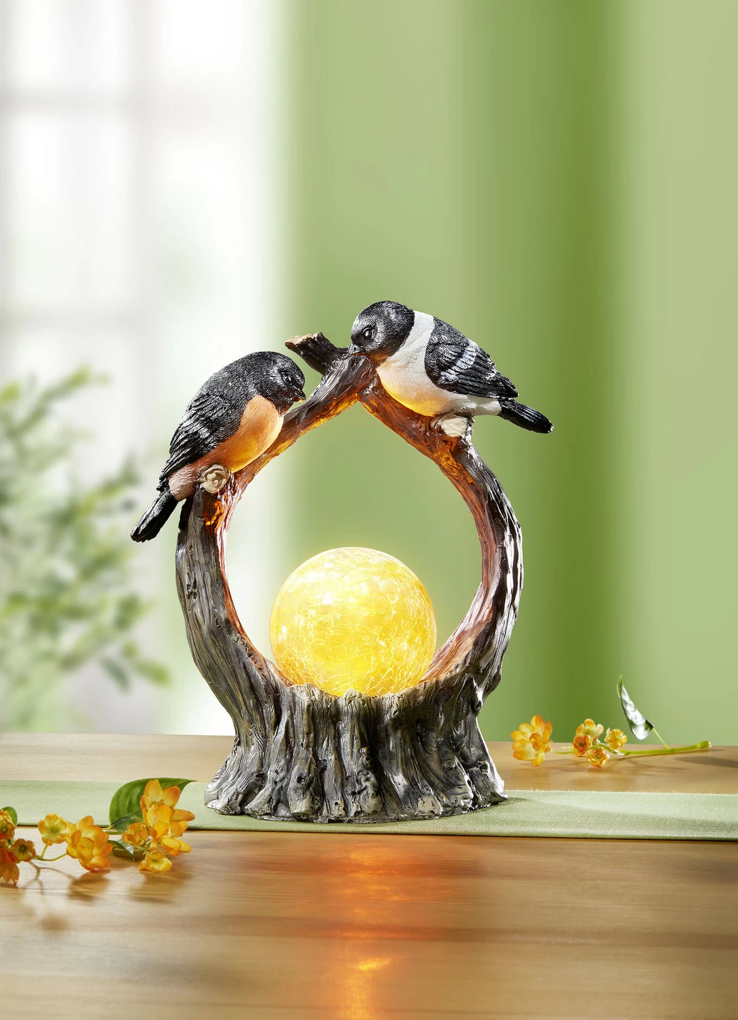 Beleuchtete Dekoration mit Vögel