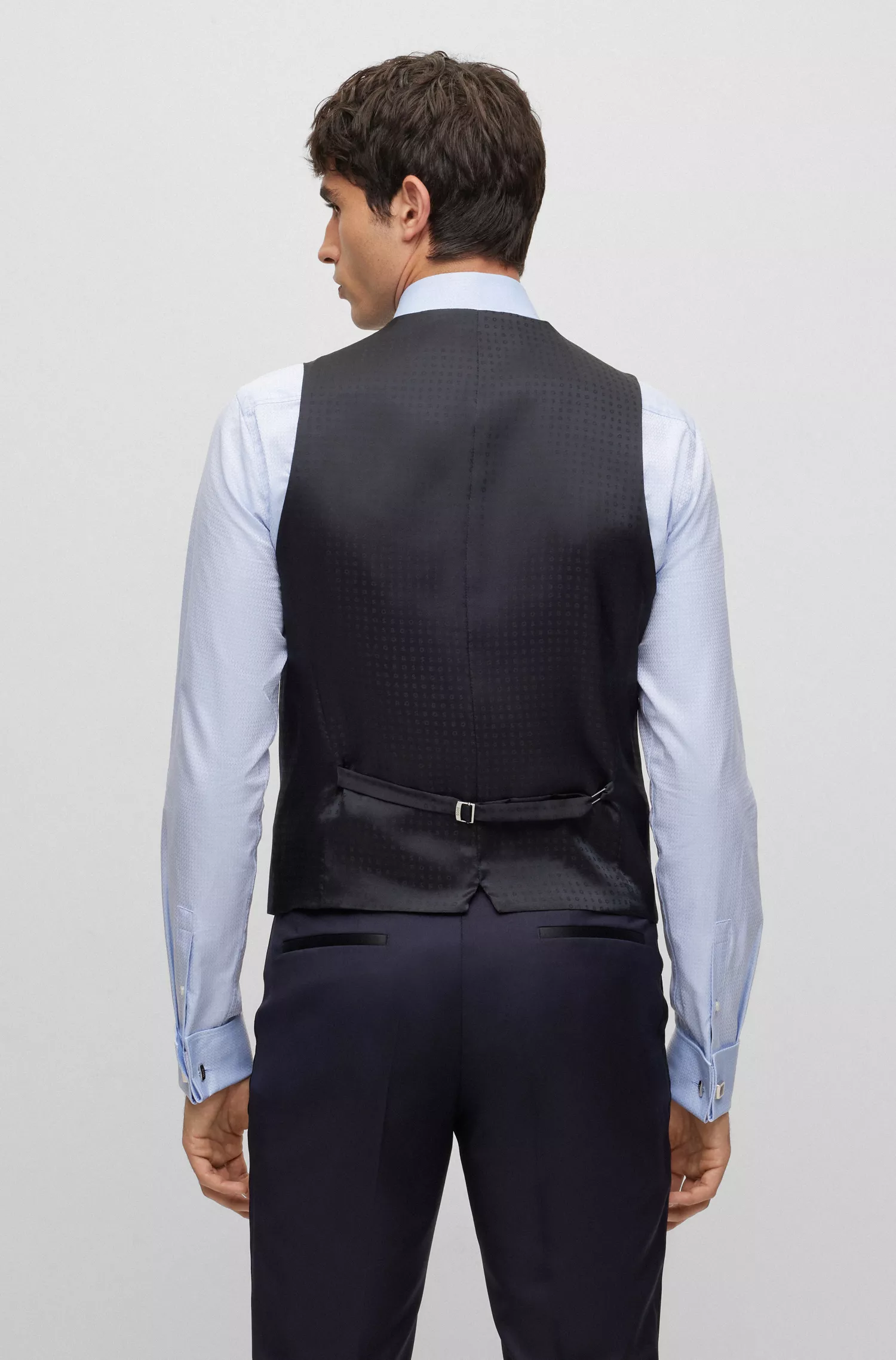 Colete BOSS preto de corte slim em sarja de lã virgem.