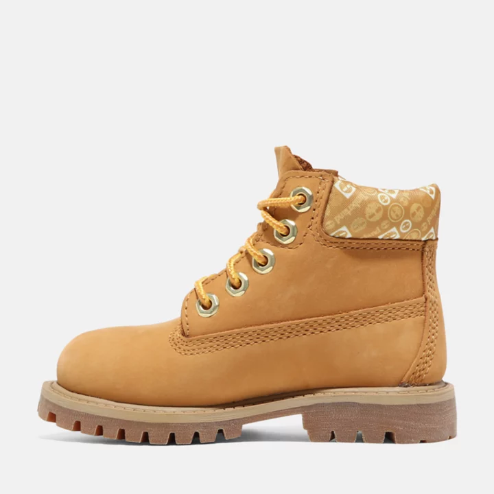 Bota infantil premium impermeável de 15 cm na cor amarela.